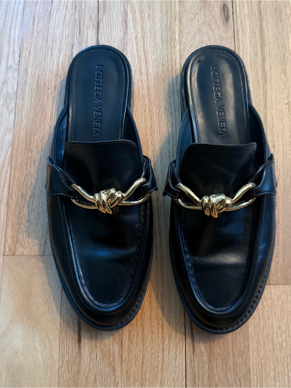 Bottega Veneta Black Leather Slide Mules with Gold Knot Accent